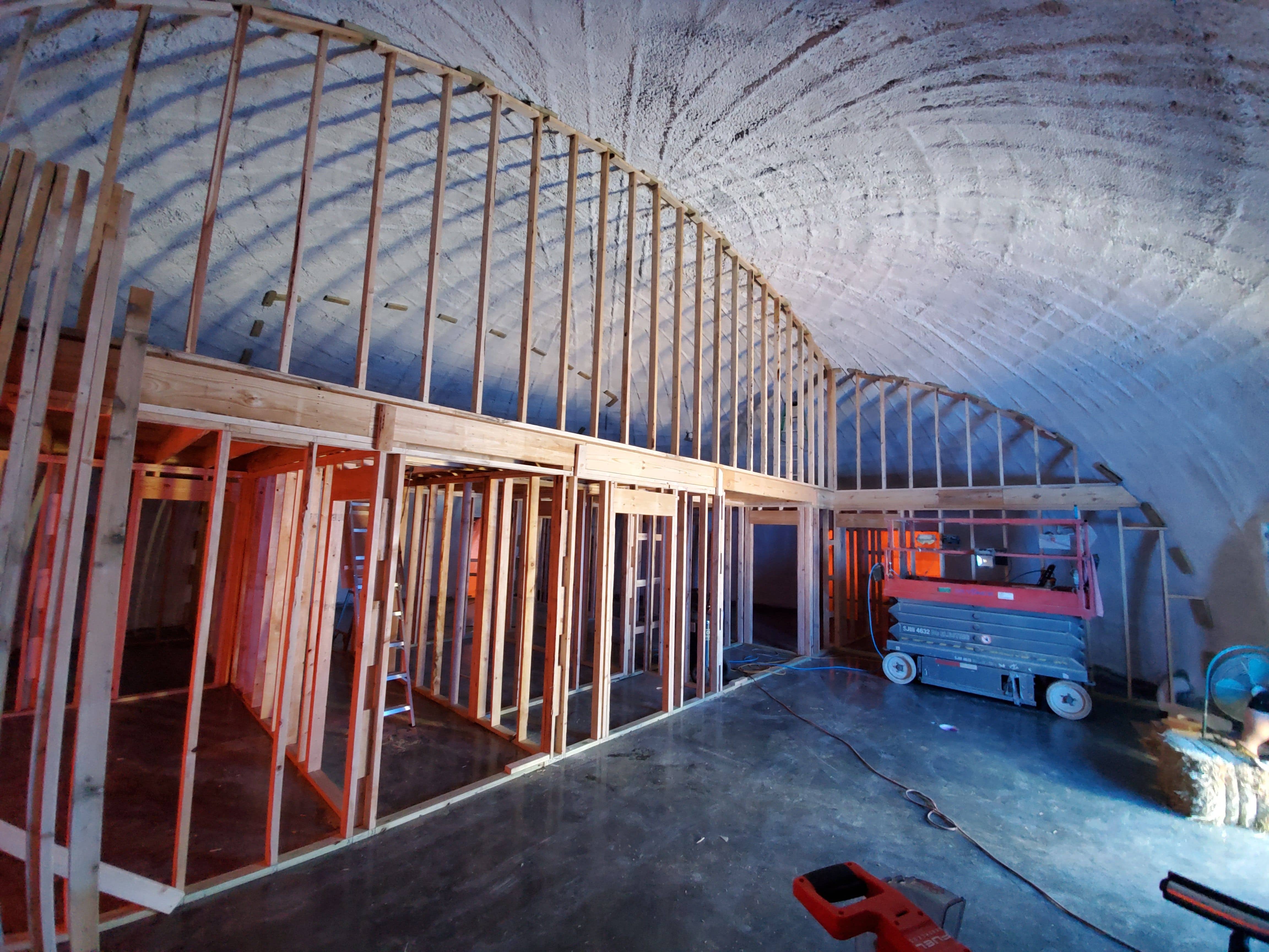 Framing inside a 50' diameter monolithic concrete dome home.