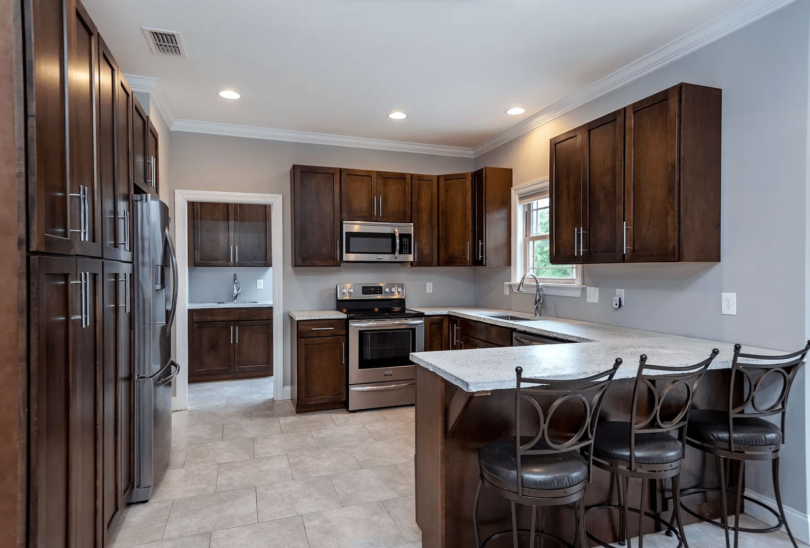 New custom kitchen complete with custom handmade concrete counter tops.